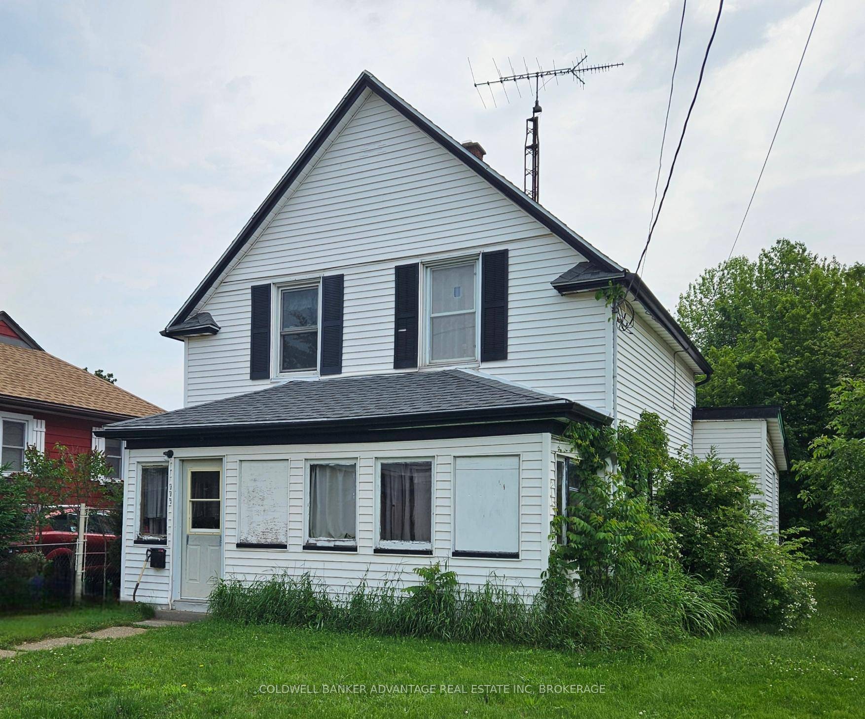 This property spans two lots and features a spacious 400 sq ft two car garage located on the secondary lot.