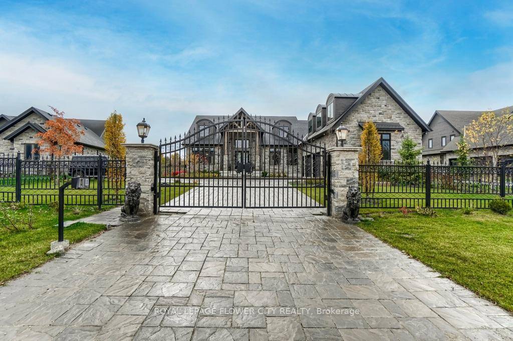 THIS STUNNING GATED MODEL HOME HAS EVERY UPGRADE YOU CAN IMAGINE !