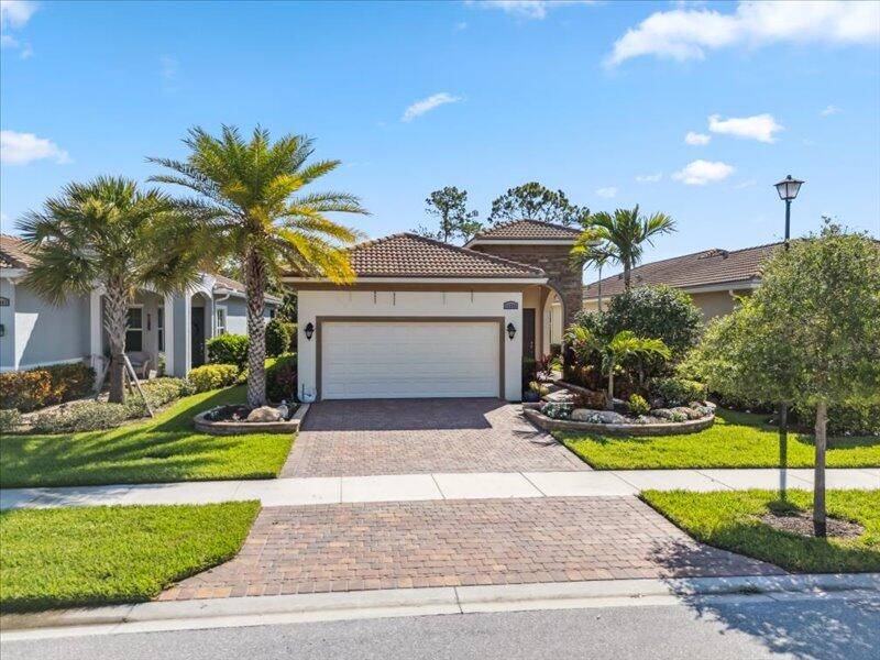 Beautifully maintained 2BR den, 2BA home located in the gated community of PGA Verano.