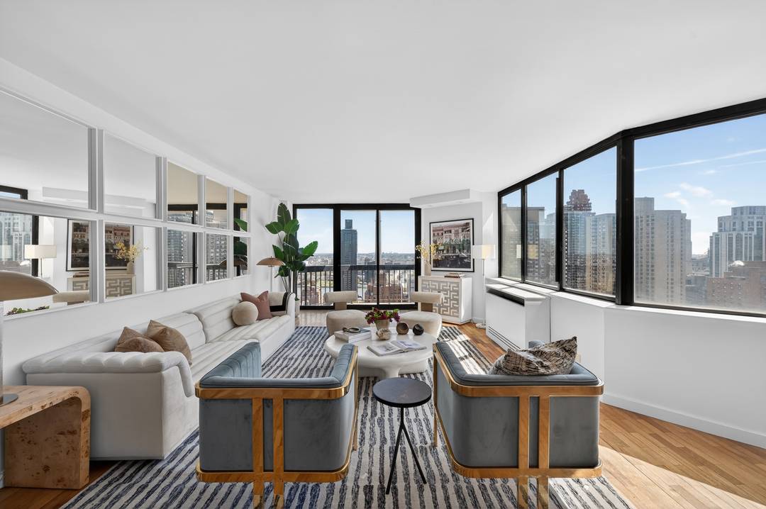 Renovated and Sprawling Upper East Side Condo with 4 Bedrooms, a Living Room, Dining Room, Home Office, 2 Balconies and incredible Light and Views.