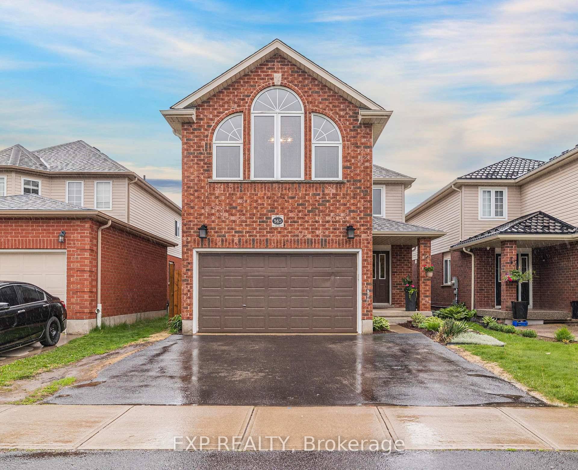 LEGAL DUPLEX ! Welcome to 345 Thomas Slee Drive, a beautifully maintained detached home located in the desirable Doon neighborhood of Kitchener.