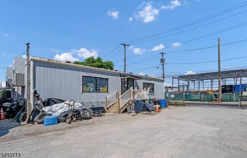 Unlock the potential of this exceptional freestanding commercial property, ideally situated with breathtaking Lake Water Views.