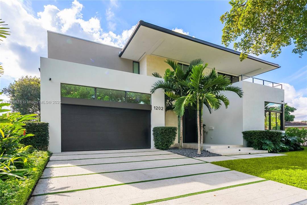 Discover contemporary luxury in this brand new tranquil Miami Shores estate, where modern sophistication meets family driven comfort.