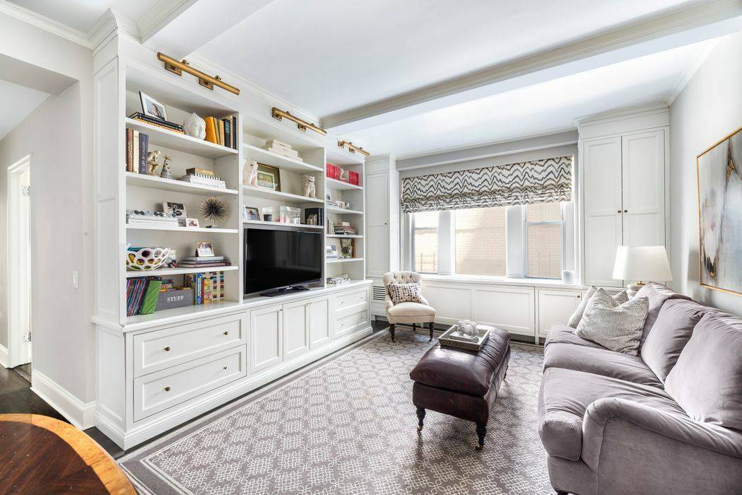 Meticulously renovated and perfectly situated on one of the Upper East Side s most desirable blocks, this elegant designer owned pre war two bedroom, two bath residence offers a rare ...