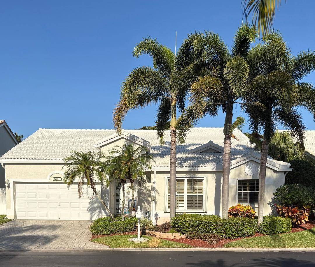 This updated 4 bedroom, 2 bath Boca Raton home features granite kitchen countertops, a spacious pantry, and a remodeled master bath with double sinks and a walk in shower.