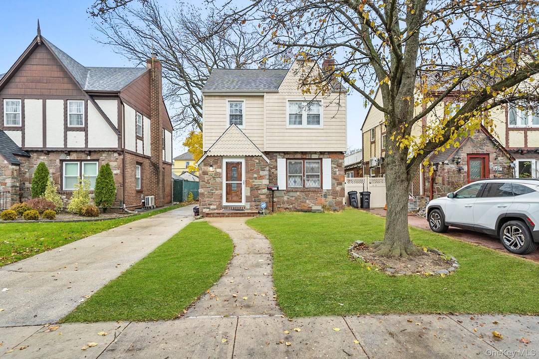 Welcome to this charming Tudor style home located in the heart of Bellerose, Queens.