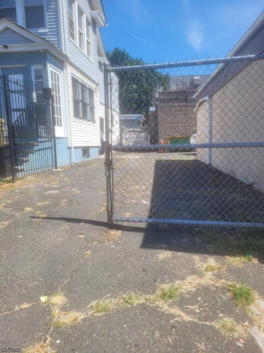 Mixed use property gated shared parking in the back
