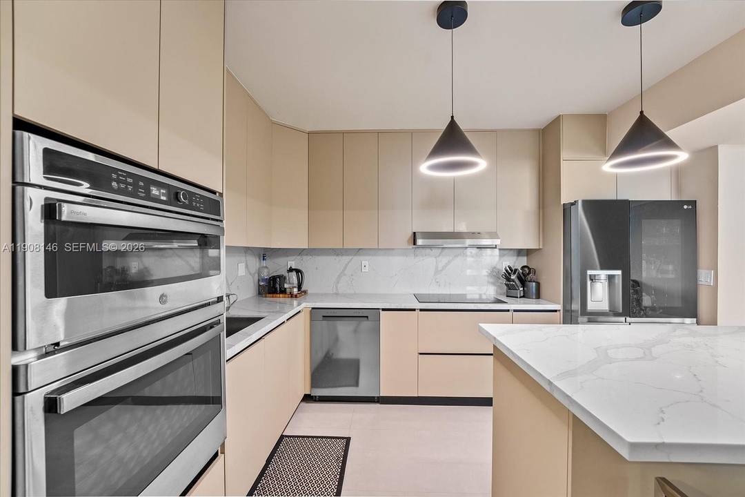 PRICED TO SELL ! Elevate your living experience in this beautifully remodeled 3 bedroom, 2 bath condo at the HAMPTONS WEST in Aventura.