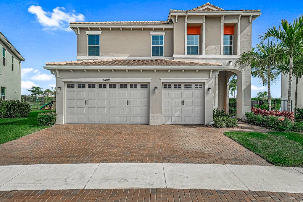 Indulge in the epitome of modern living in this stunning Laurel model home, perfectly situated within the sought after community of Westlake near Loxahatchee, Florida.