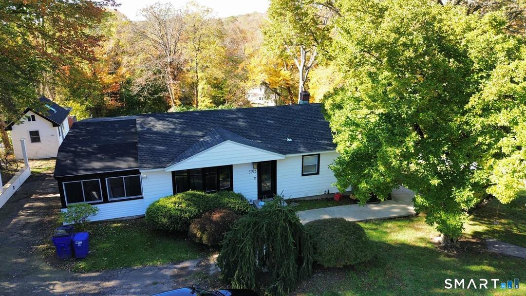 This ranch style sits on a generous lot and has a nicely landscaped backyard.