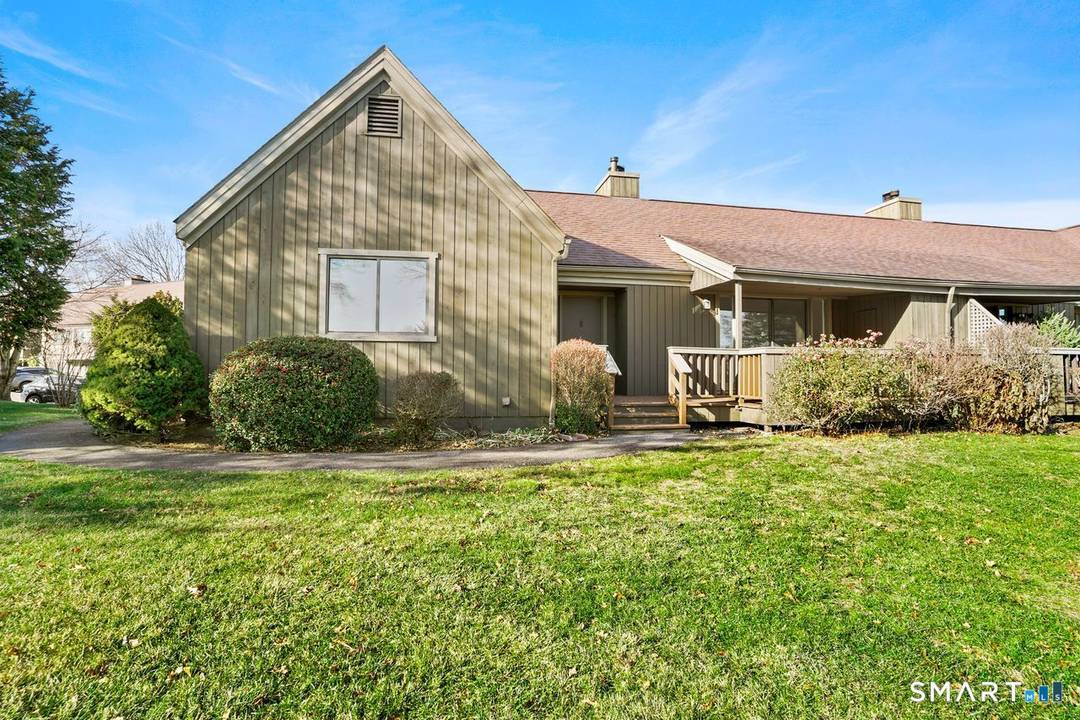 Welcome to this beautifully renovated Wolcott model offering resort style living w sweeping views of the golf course !