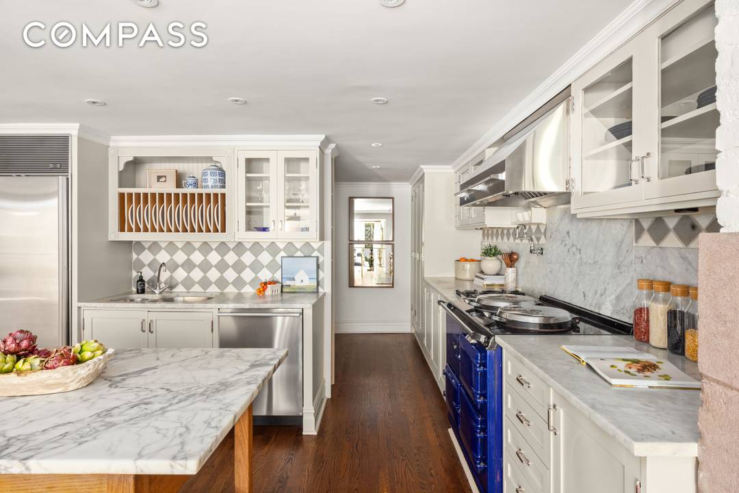 Situated mid block on tree lined East 11th street, this exceptionally rare 4 bedroom, 3 bath duplex home with an 800sqft landscaped garden offers an unparalleled living experience, reminiscent of ...
