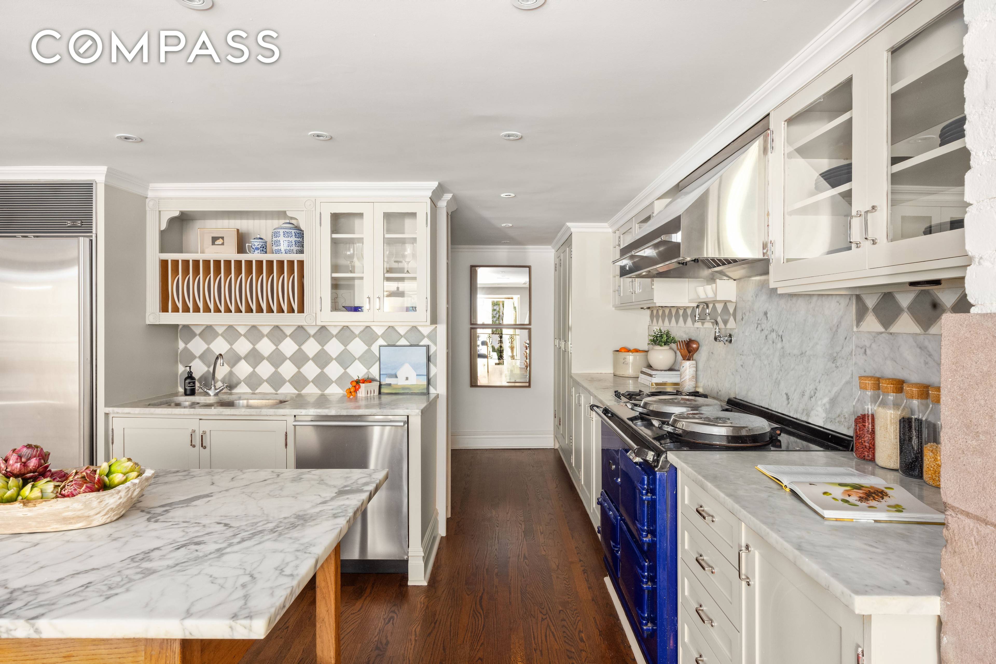 Situated mid block on tree lined East 11th street, this exceptionally rare 4 bedroom, 3 bath duplex home with an 800sqft landscaped garden offers an unparalleled living experience, reminiscent of ...