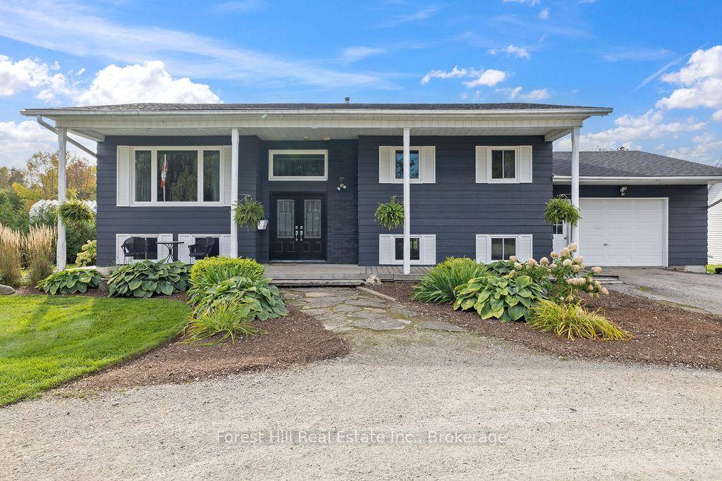 Set on a spacious, professionally landscaped country lot, this meticulously maintained 2, 069 sq ft bungalow offers the best of modern comfort in a peaceful, natural setting.