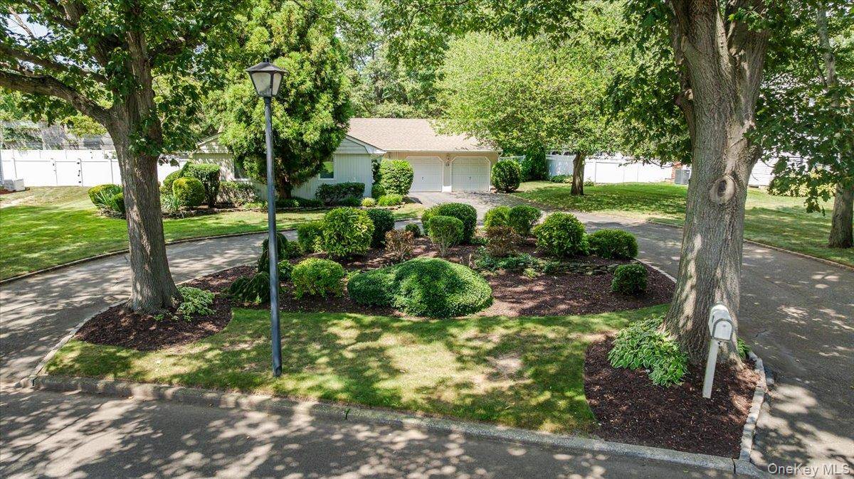 Welcome to this charming ranch home set on a flat half acre lot in a lovely Dix Hills neighborhood.