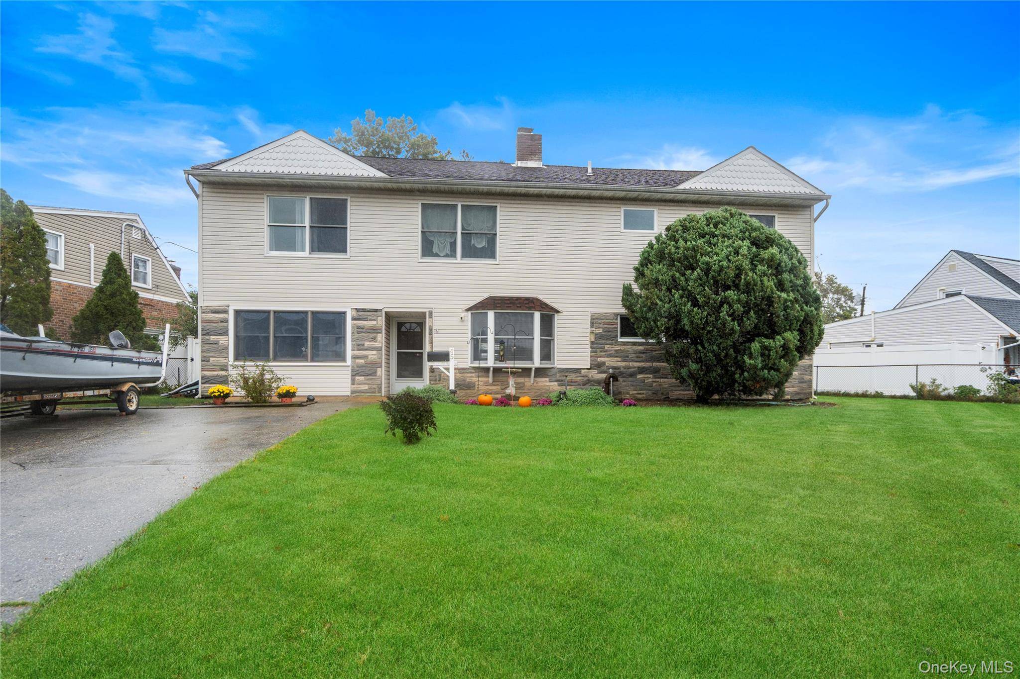 Large Expanded Cape in the Island Trees School District of Levittown.