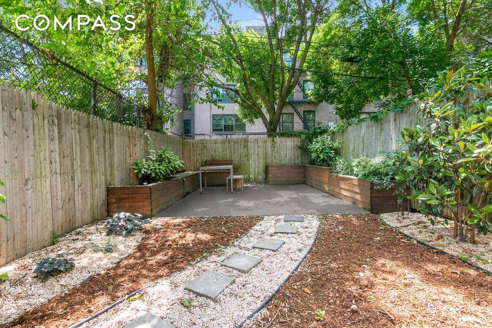 This 3 bedroom, 2. 5 bath upper duplex features three exposures North, South and East and three unique outdoor spaces, including a private garden.