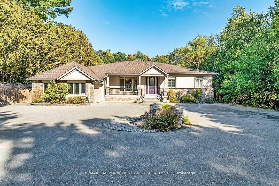 Macedonian Village Opportunity Bungalow Living on a Premium Conservation Lot, this custom built bungalow offers exceptional space, privacy, and long term versatility on a premium 102.