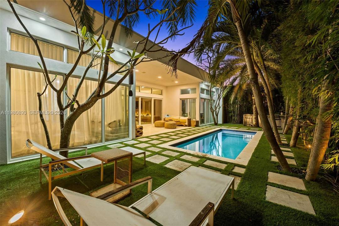 Renovated Mid Century residence in the heart of Mid Beach offering 5 beds and 5 baths.