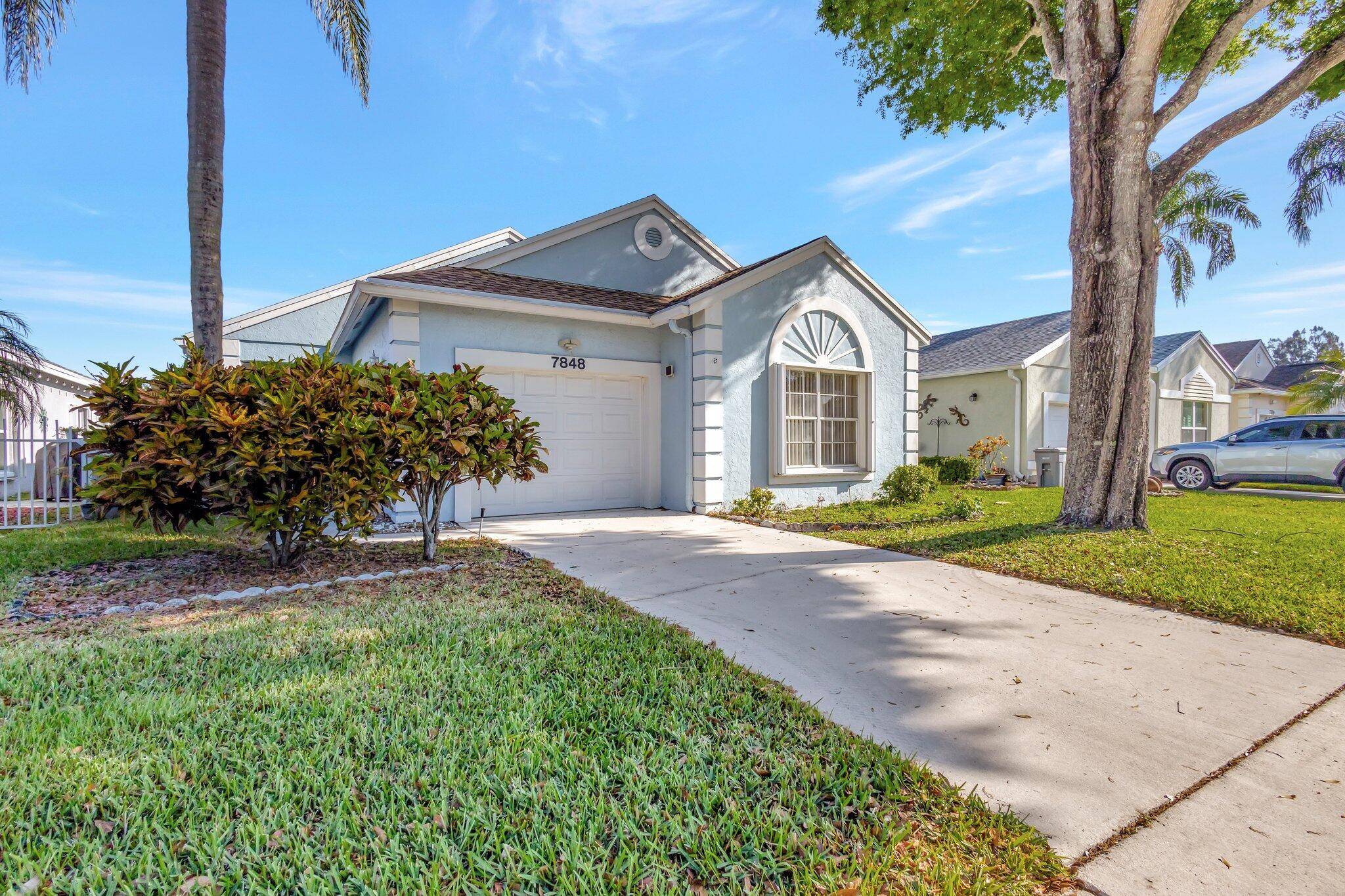 Experience life in a delightful neighborhood with a home that awaits your personal touch.
