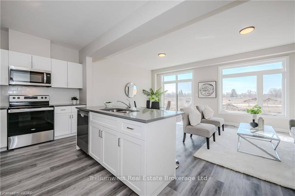 Imagine living in a serene town, just minutes from the city and the 401.