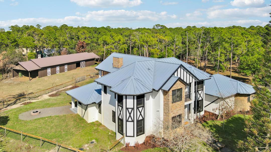 Welcome to this exquisitely renovated modern farmhouse estate, where refined luxury meets peaceful country living.