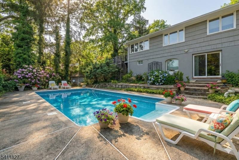 Welcome to a rare Mountainside ranch with a true mother daughter layout and walk out ground level, perfect for guests, or flexible space.