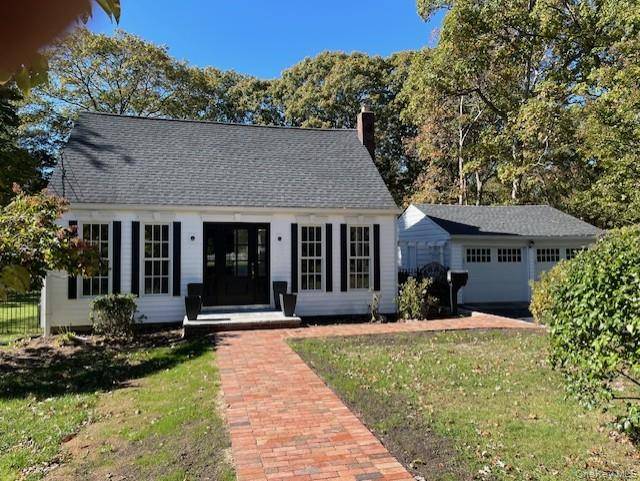 Charming 4 Bedroom Updated Cape Located on Beautiful, Fenced 1 2 Acre Level Property.