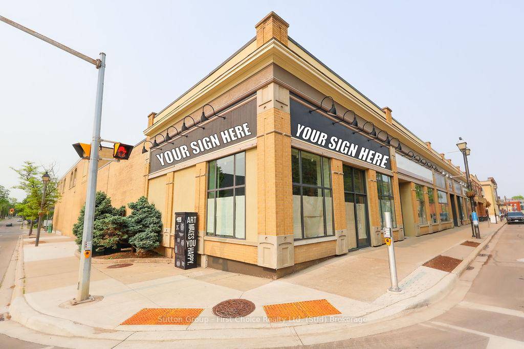 Prime downtown corner retail location lease opportunity showcasing large windows, high ceilings, good lighting, polished concrete floors and included underground tenant parking available.
