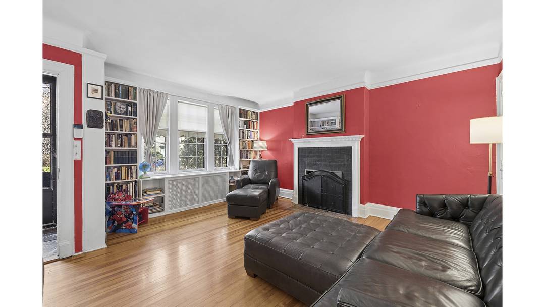 Set on a picturesque, tree lined street in the heart of Forest Hills Gardens, this charming Tudor townhome captures the storybook character and timeless elegance that define the neighborhood.