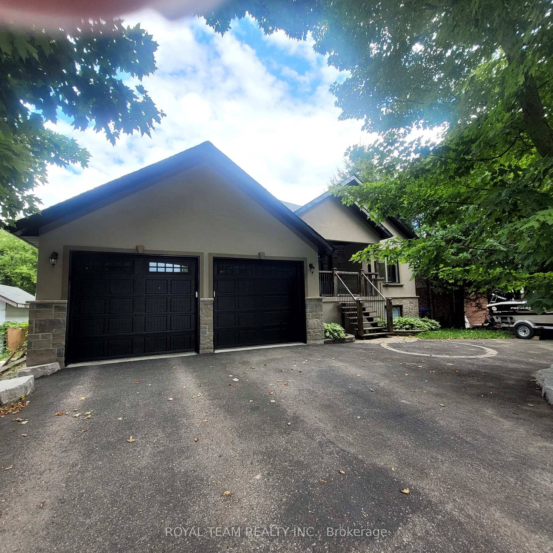 Custom Built Stucco And Stone Home With Walk Out.