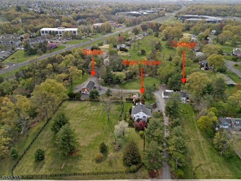 Nestled on 4. 9 picturesque acres you will find this unique private estate.