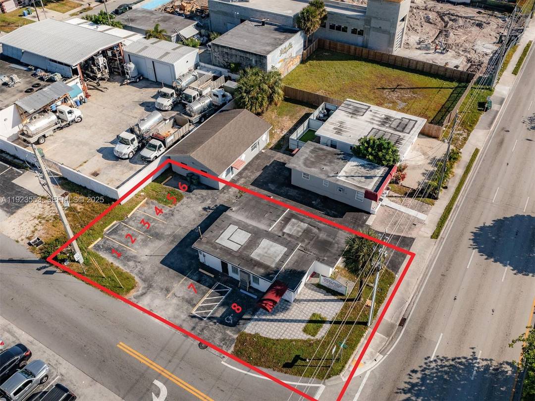 HUGE OPPORTUNITY. This prime commercial property offers excellent visibility on a high traffic corner lot, with thousands of cars passing by daily.