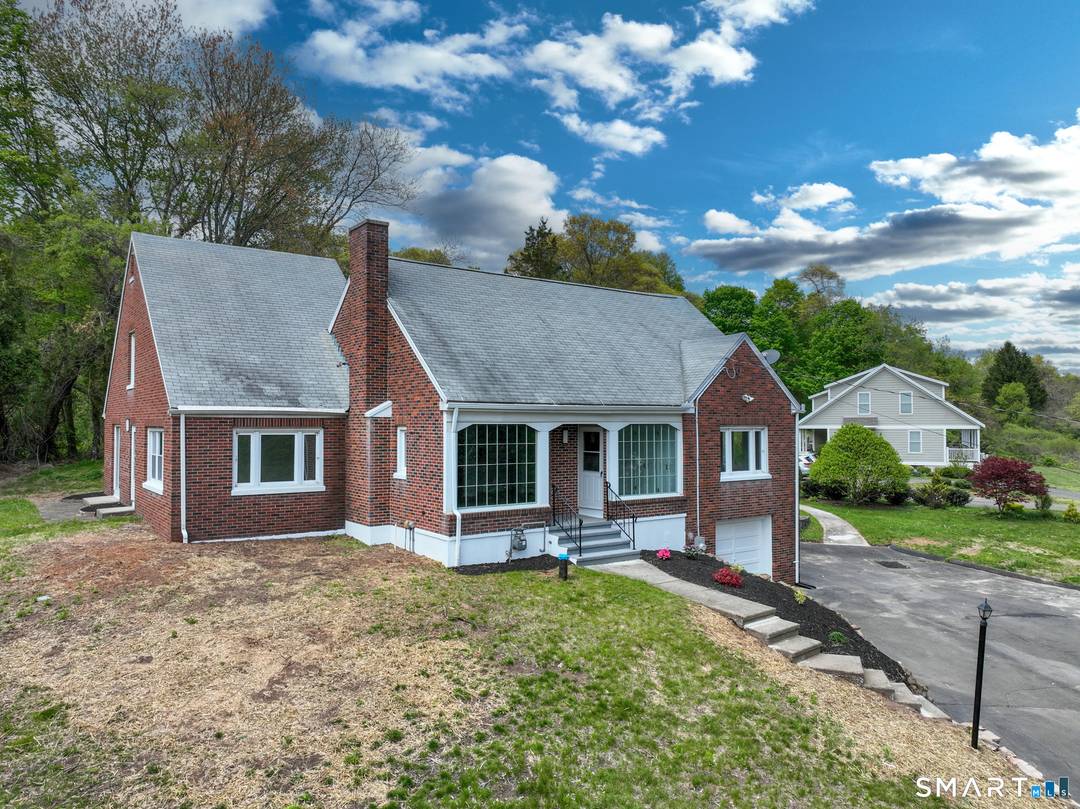 1920 Hartford Turnpike in North Haven, Connecticut is a classic Cape Cod style residence set on approximately 0.