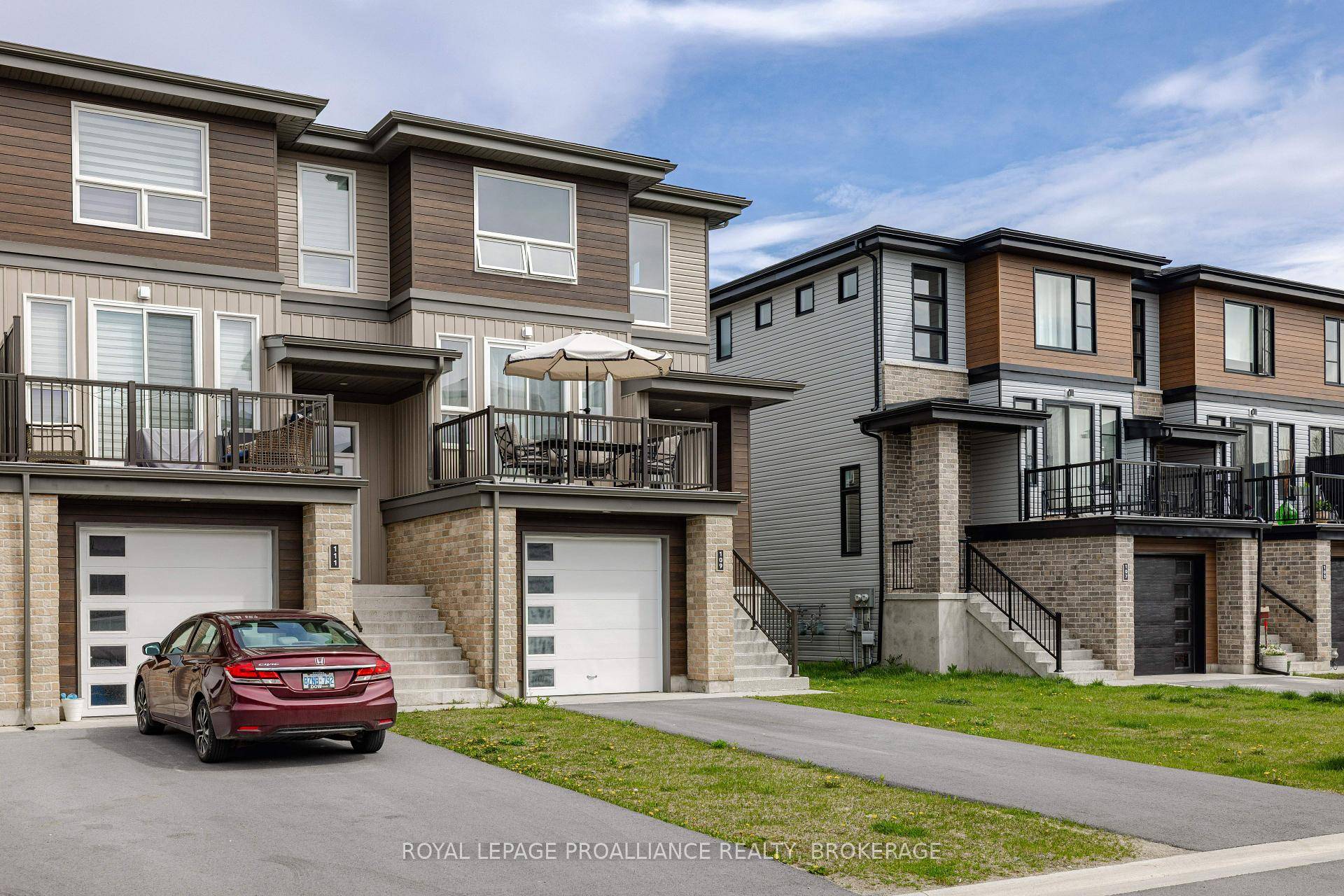 Discover this stunning, modern end unit town home in the welcoming community of Amherstview !