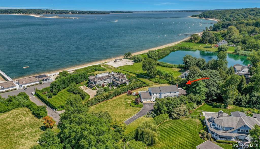 Discover a rare waterfront opportunity in the prestigious Bay Crest area of Huntington Bay.