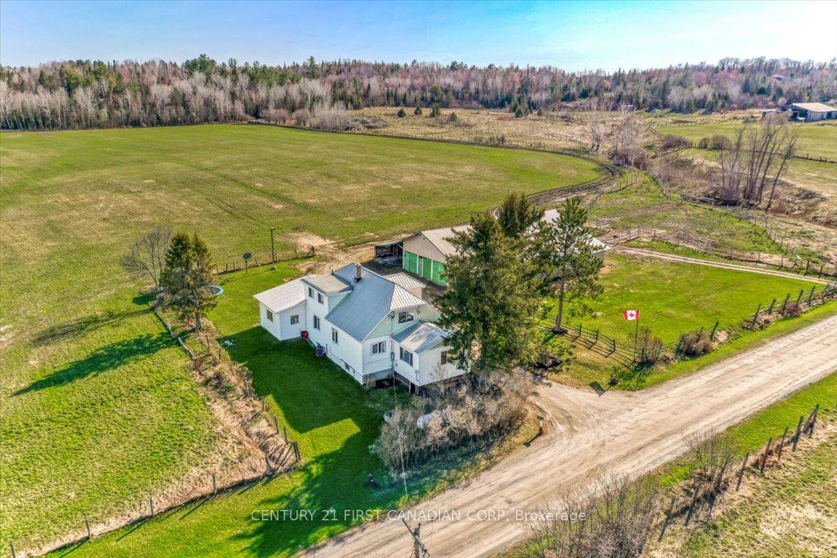 Hobby Farm Haven ! This 4 Bed farmhouse with a barn is less than an hour from Sudbury !