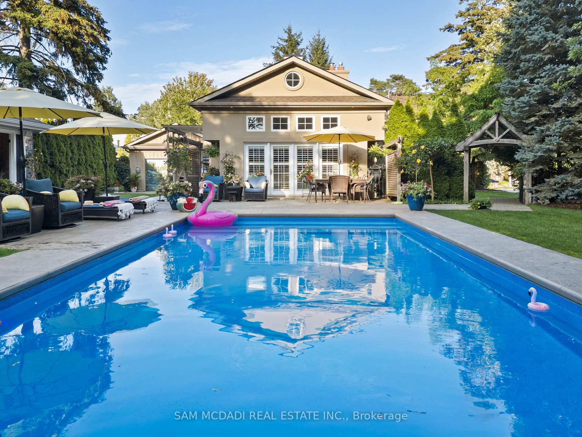 Welcome to 1522 Glenhill Crescent in the prestigious Lorne Park, where timeless charm meets resort style living on a generous 80 x 155 ft lot.