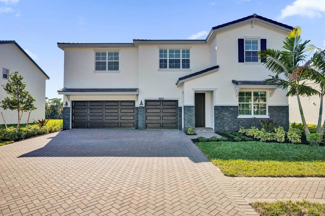 Welcome to 6837 Cobia Circle, a brand new, never lived in lakefront residence in the gated community of Boynton Waters, available now for immediate occupancy.