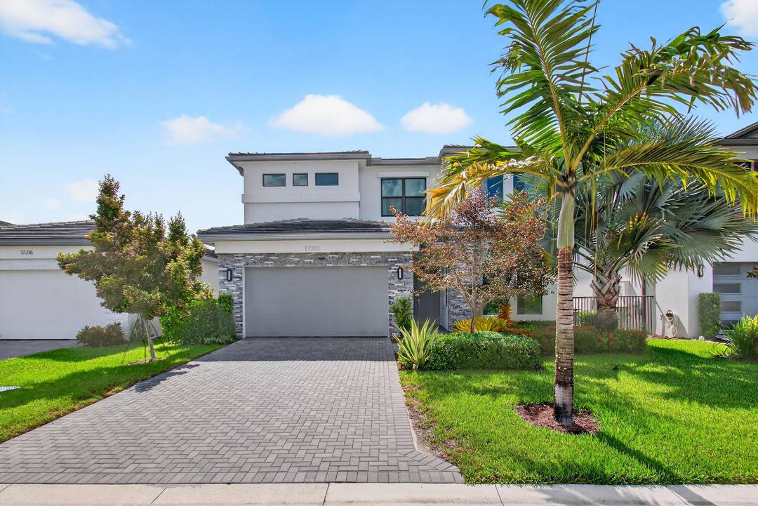 Must see 5BR, 5BA lakefront residence in the prestigious guard gated community of Lotus, Boca Raton.