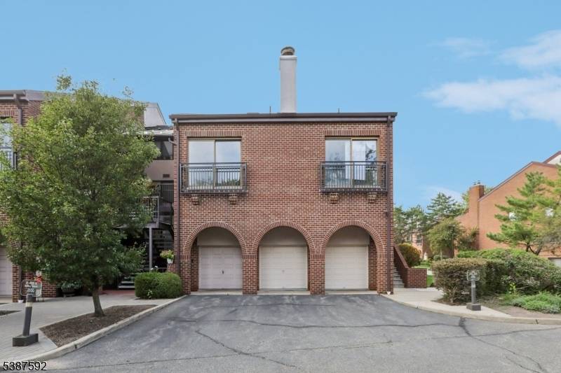Spacious 3 BR, 3 Bath, 2, 400 sqft townhome style duplex in the Courts of Glenpointe Luxury Condominium.