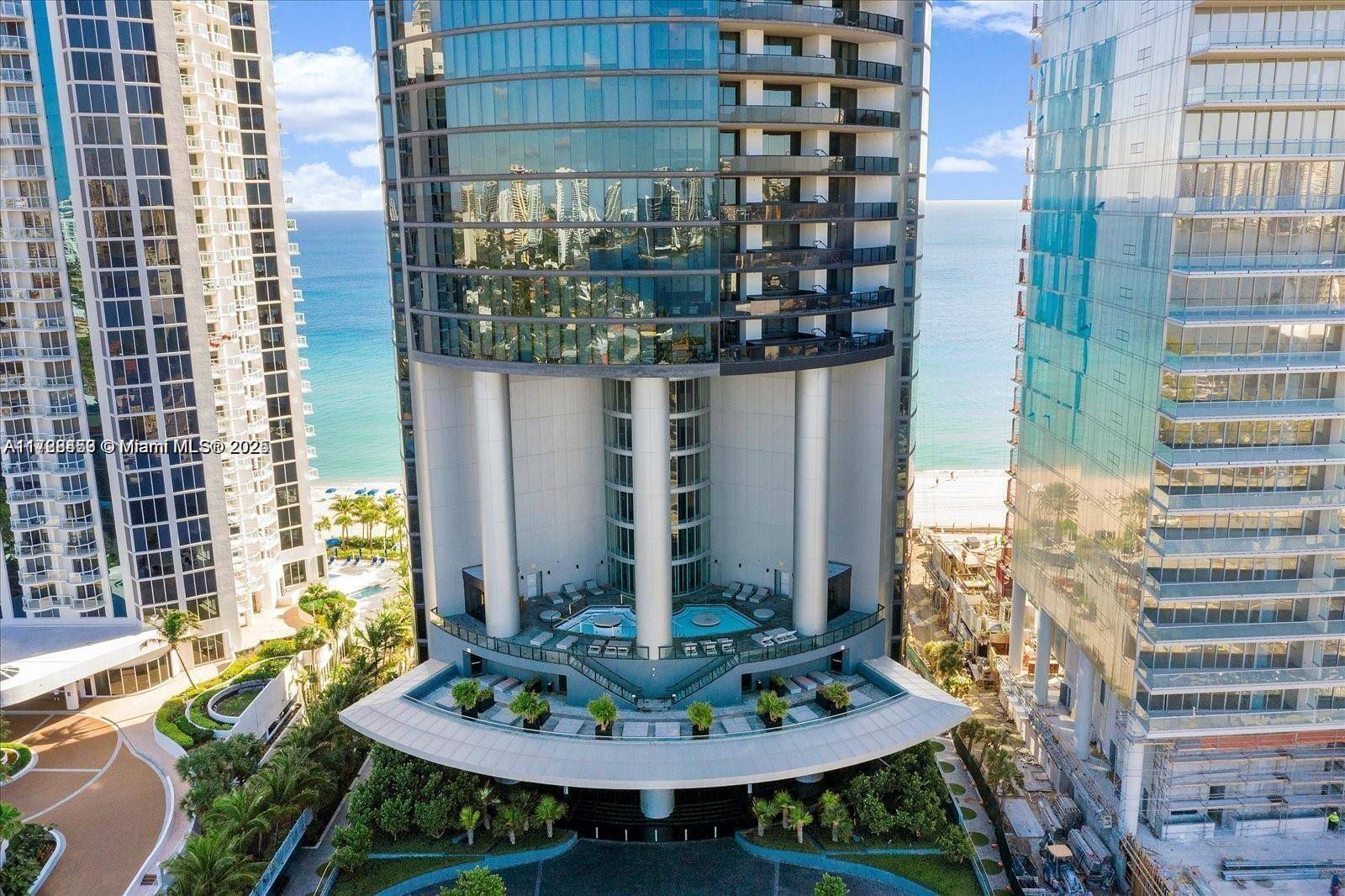 Two story oceanfront condo at Porsche Design Tower 3 bed 4.