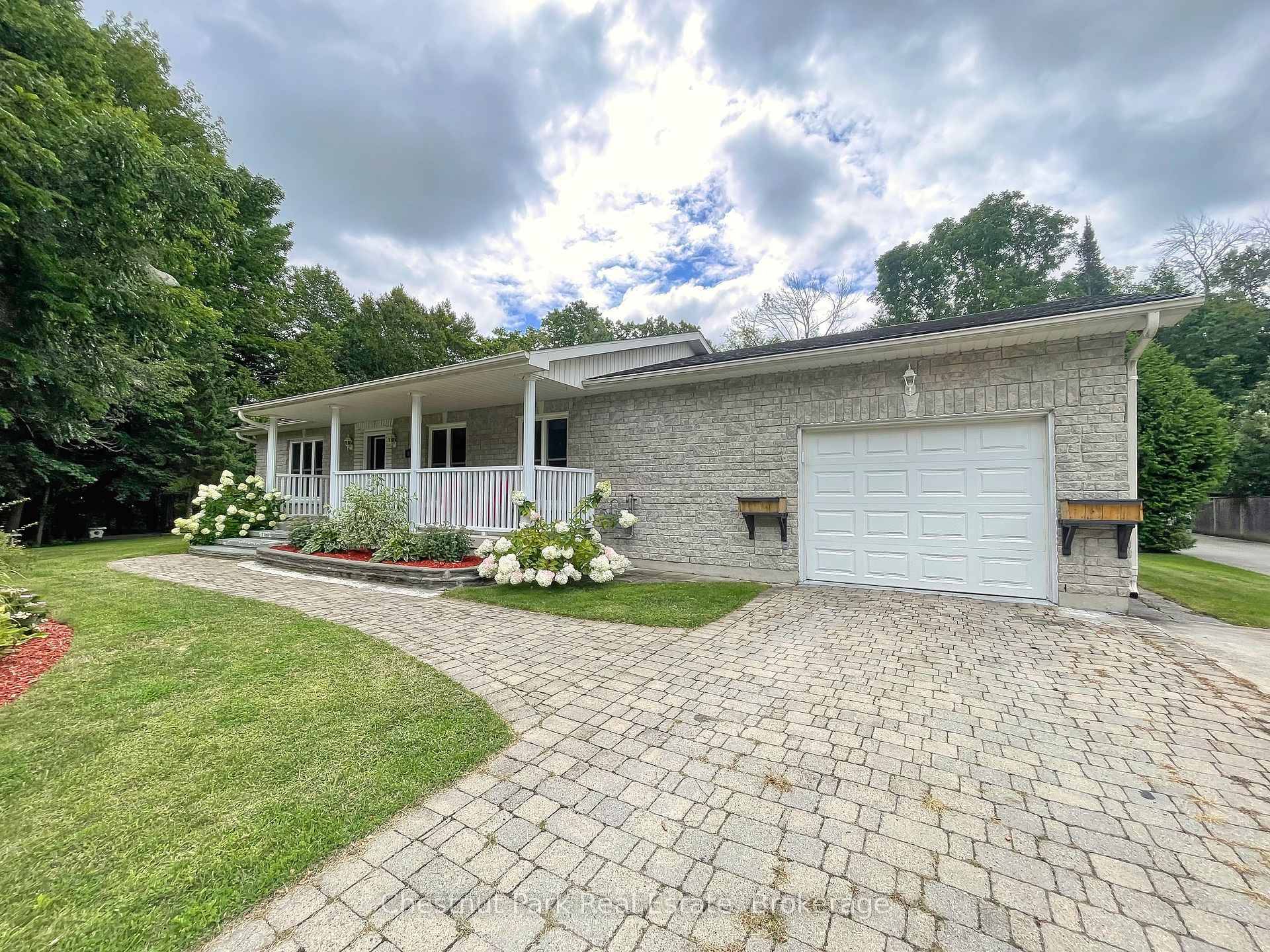 Welcome to this charming 3 1 bedroom stone bungalow tucked away at the end of a quiet street on the desirable west side of Owen Sound.
