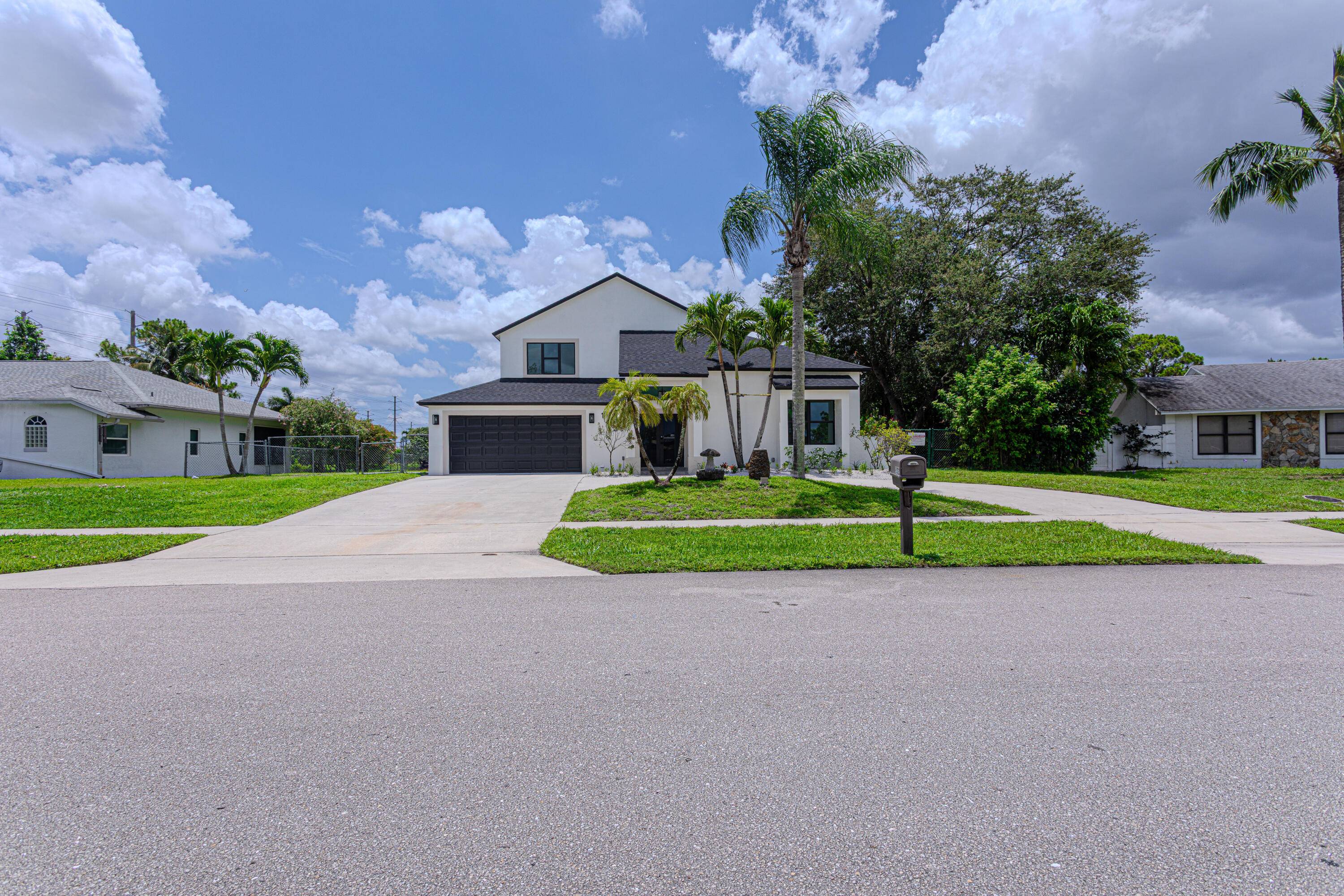 Completely remodeled waterfront home in Royal Palm Beach with all new appliances and brand new A C !