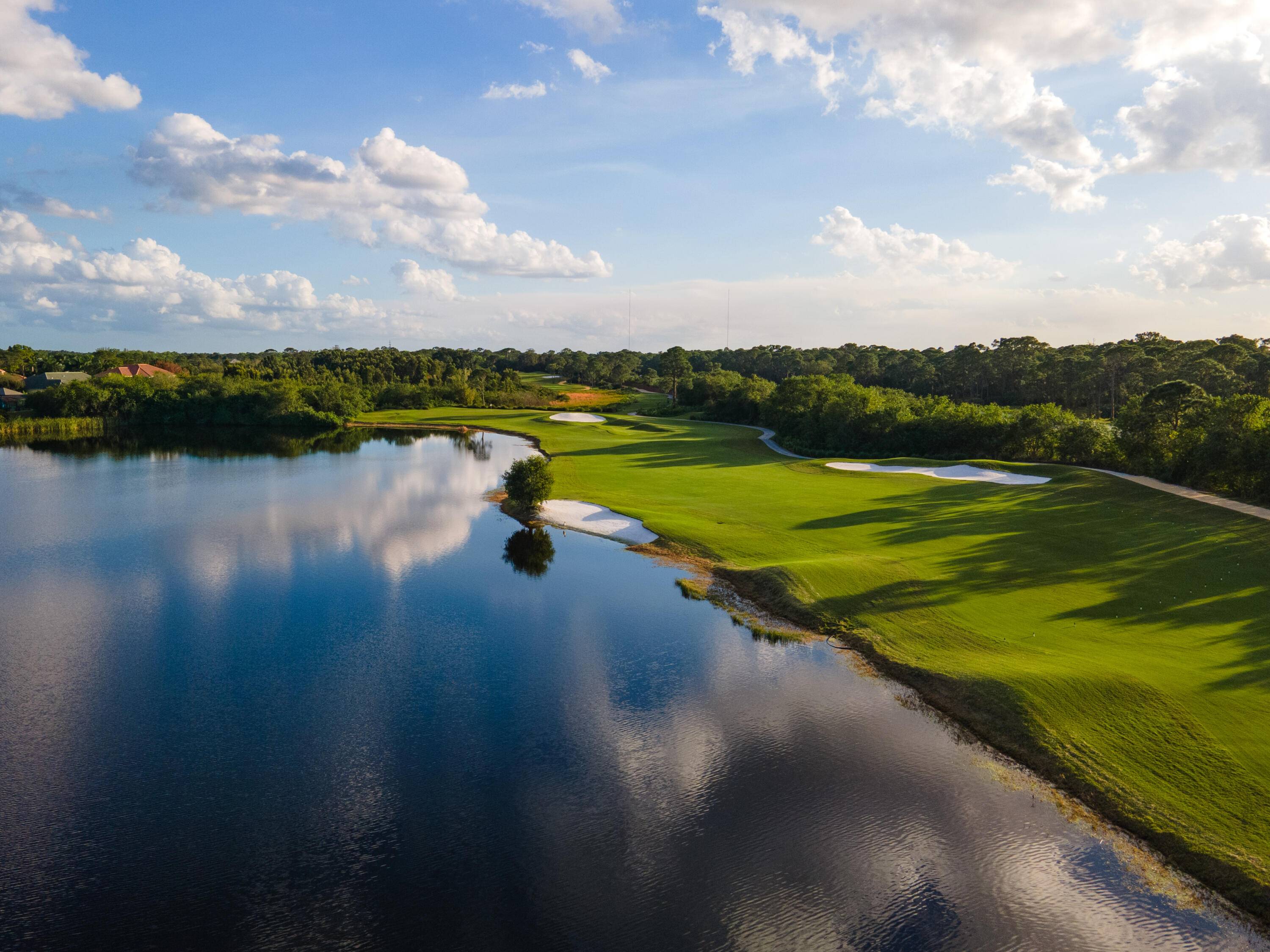 Welcome to your dream oasis, where luxury meets functionality in this stunning new construction home nestled on the pristine golf course, right at the first hole.