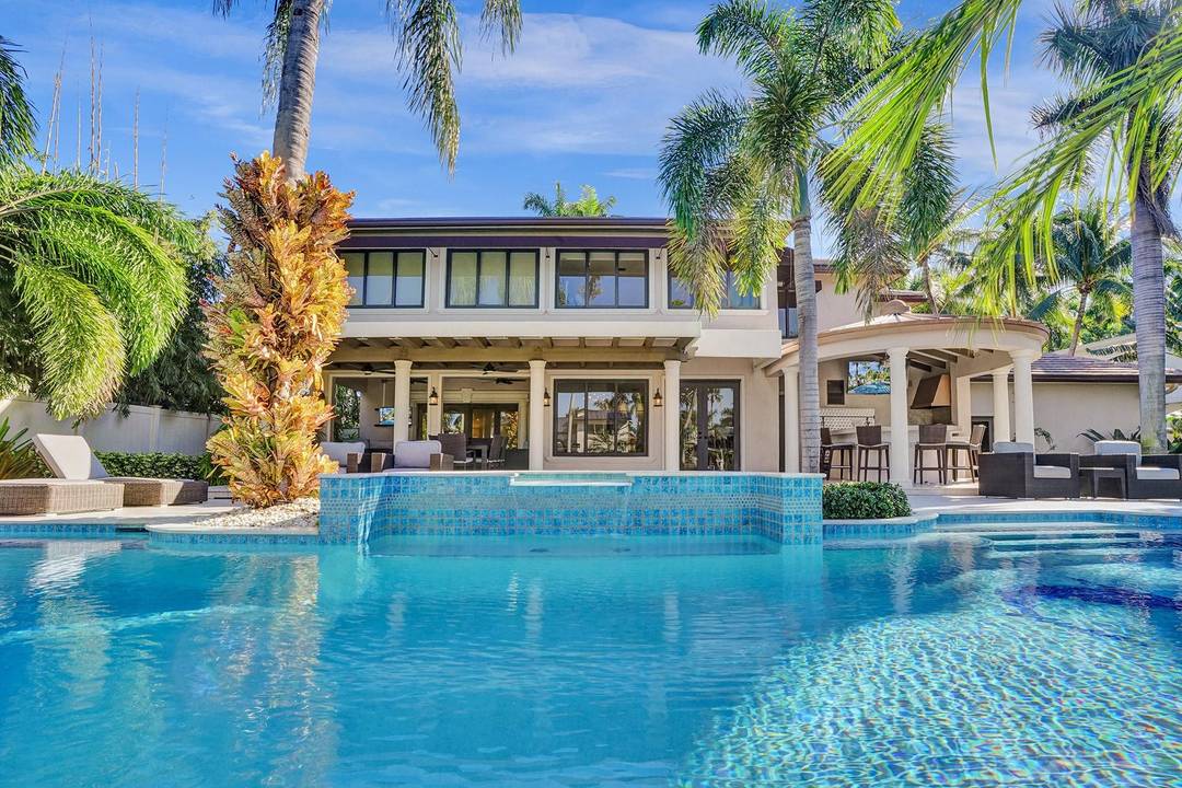 Live in luxury on Las Olas Isles with a beautifully appointed 5 bedroom, 5 bath modern residence featuring 100' feet of deep water frontage and ocean access.