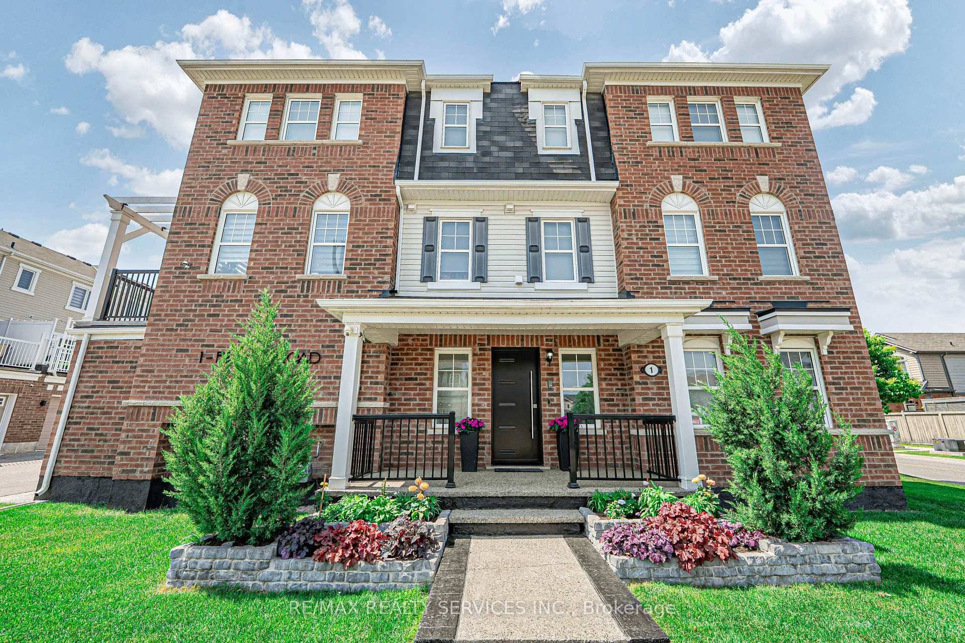 EXECUTIVE FREEHOLD TOWNOME ON A PREMIUM CORNER LOT WITH TWO CAR GARAGE.