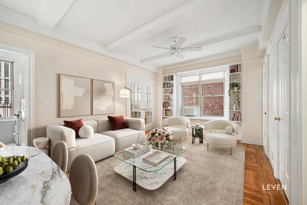 Nestled on a tree lined street, less than a block from both Central Park and Lincoln Center one bedroom in a beautifully maintained, prewar elevator co op, offering charming architectural ...