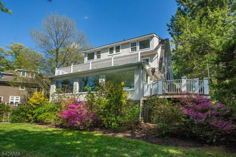 Your dream home awaits ! Tucked away on a tranquil cul de sac, this historic Dutch Colonial graces a picture perfect 0.