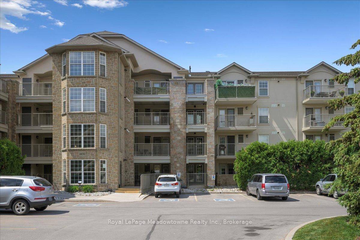 Chic Ground Level Condo with Private Terrace Overlooking Green Space.